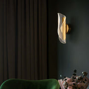 Living Room Television Background Wall Stairs Hallway Corridor Lamps in gold and transparent design on dark wall.